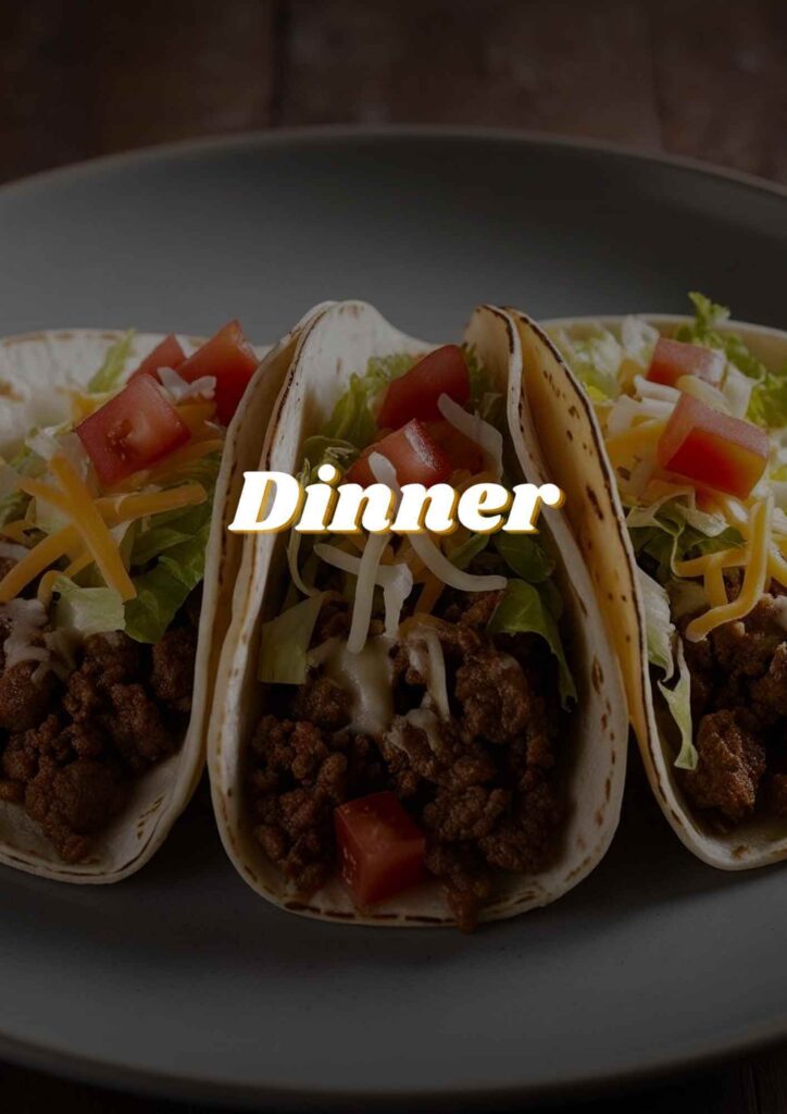 Three tacos arranged on a plate with the word "dinner" displayed prominently beside them