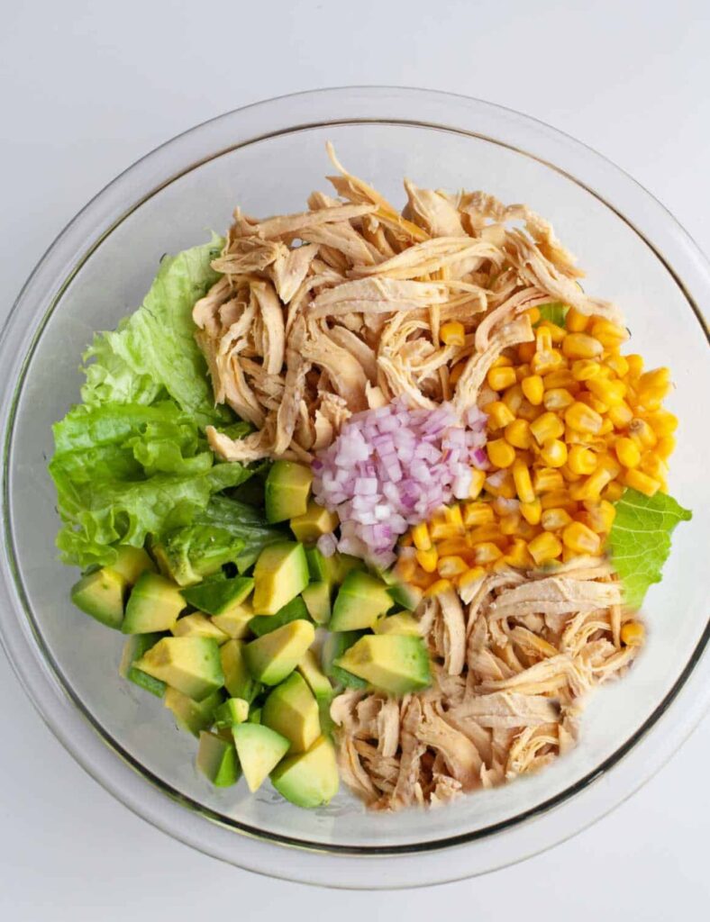 2 cups cooked chicken, shredded
1 ripe avocado, mashed
1/4 cup Greek yogurt or mayonnaise
1 tablespoon lime juice
1/4 cup red onion, diced
1/4 cup celery, diced
Salt and pepper to taste
Optional: chopped cilantro or parsley