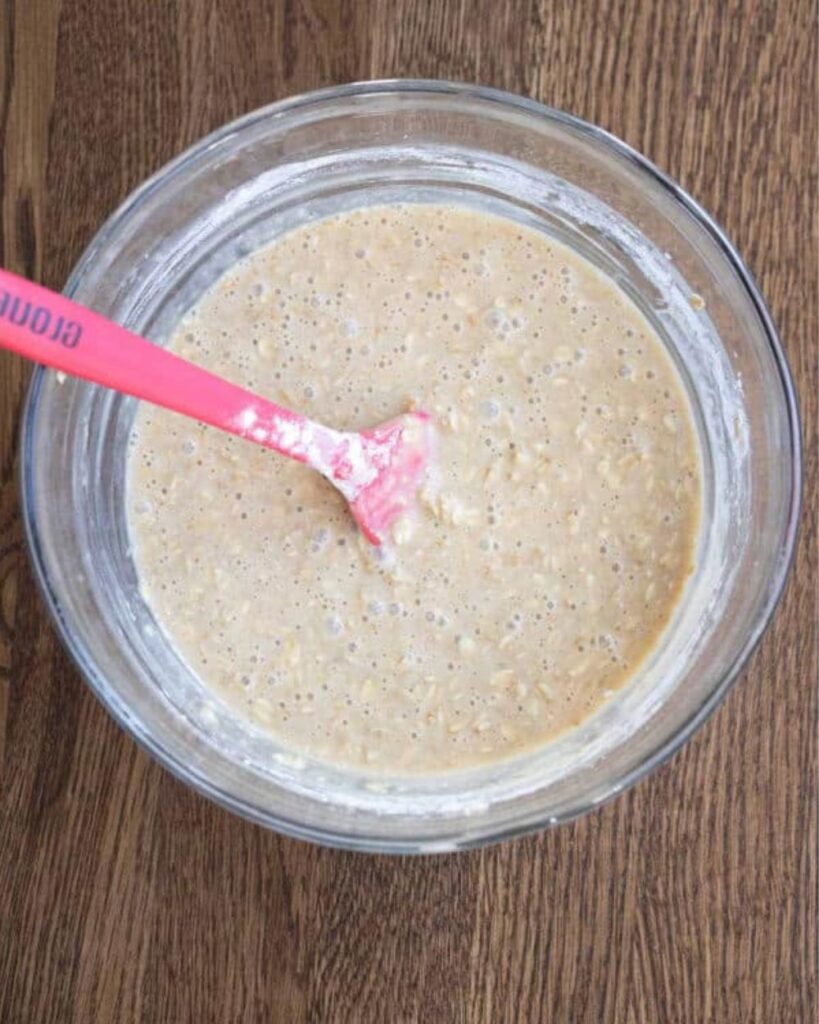 Gradually add the dry ingredients to the wet mixture. Stir until just combined. Be careful not to overmix; it's okay if there are a few lumps.