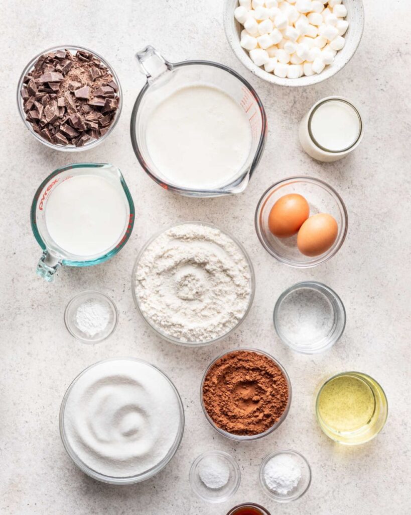 1 cup dark chocolate chips
4 tablespoons unsalted butter
3 large eggs, separated
1/4 cup granulated sugar
1 teaspoon vanilla extract
1 cup heavy cream
1/2 cup powdered sugar
Pinch of salt