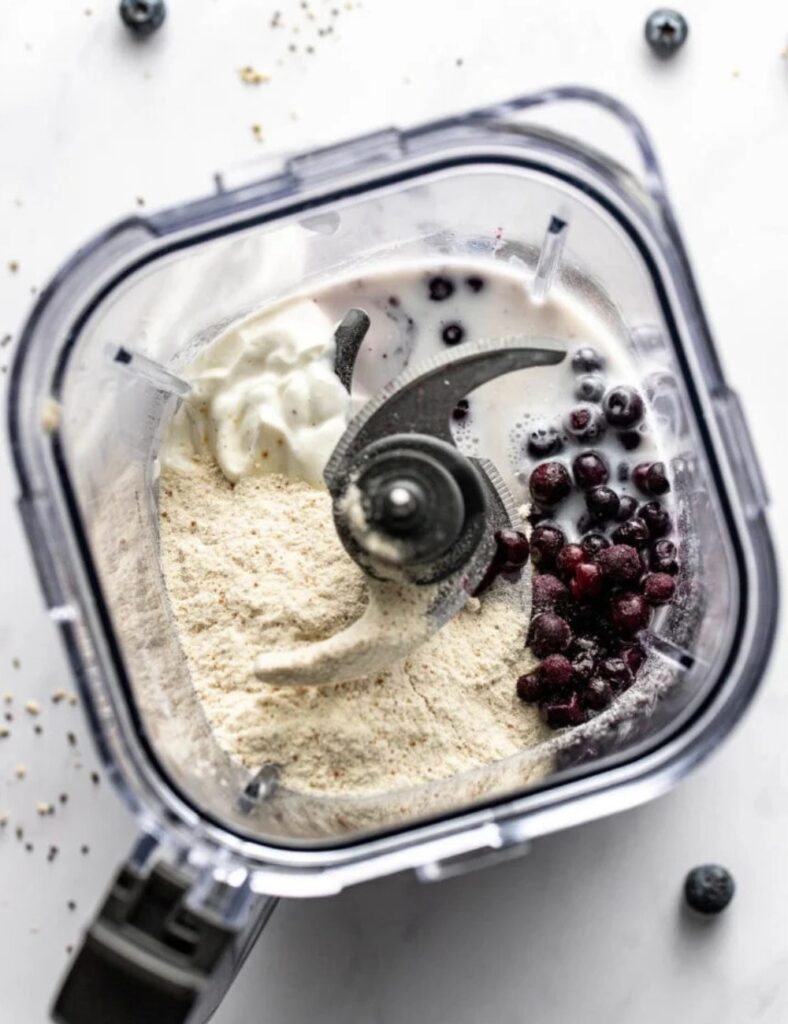 a blender with ingredients in it