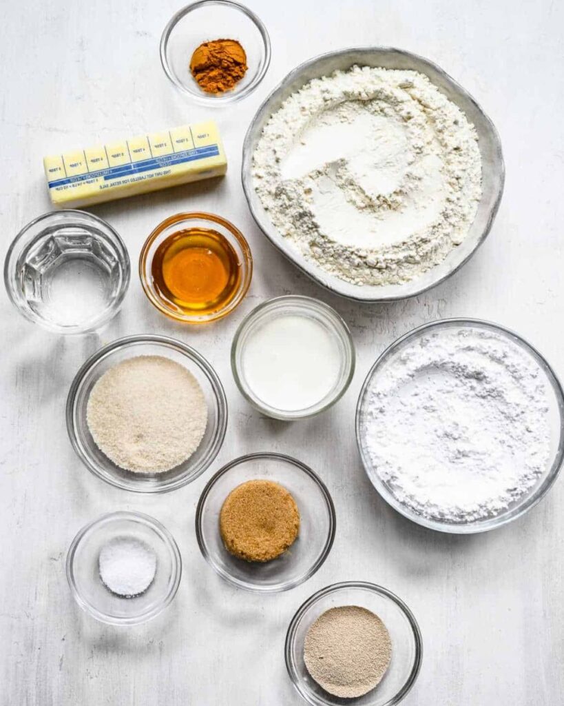 2 cups all-purpose flour
1/4 cup sugar
1/2 teaspoon salt
1 packet (2 1/4 tsp) active dry yeast
1/2 cup warm milk (110°F)
1/4 cup unsalted butter, melted
1 large egg
1/2 cup honey
1 teaspoon ground cinnamon
Powdered sugar for glazing (optional)