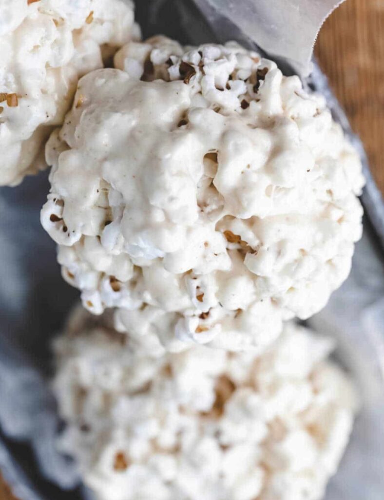 popcorn balls; they remind me of childhood days spent crafting treats for Halloween or movie marathons with family and friends. 