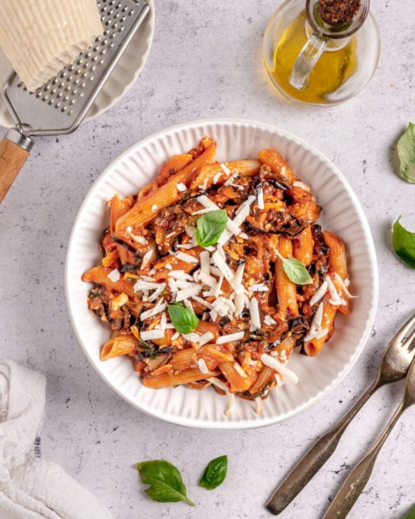 Plate the pasta and if desired, top it with a sprinkle of grated ricotta salata cheese. Serve hot and enjoy the delightful flavors of this authentic Italian dish!