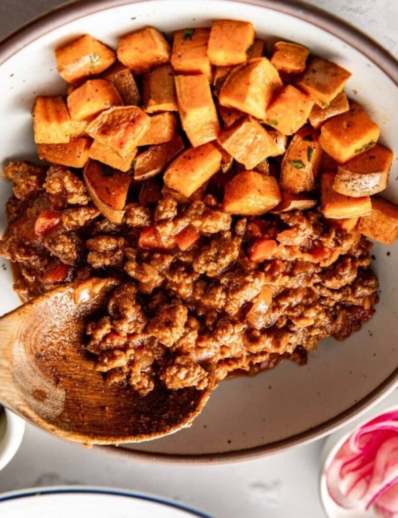Spoon the Sloppy Joe mixture over a bed of cooked rice or quinoa. Garnish with chopped parsley for a fresh touch.