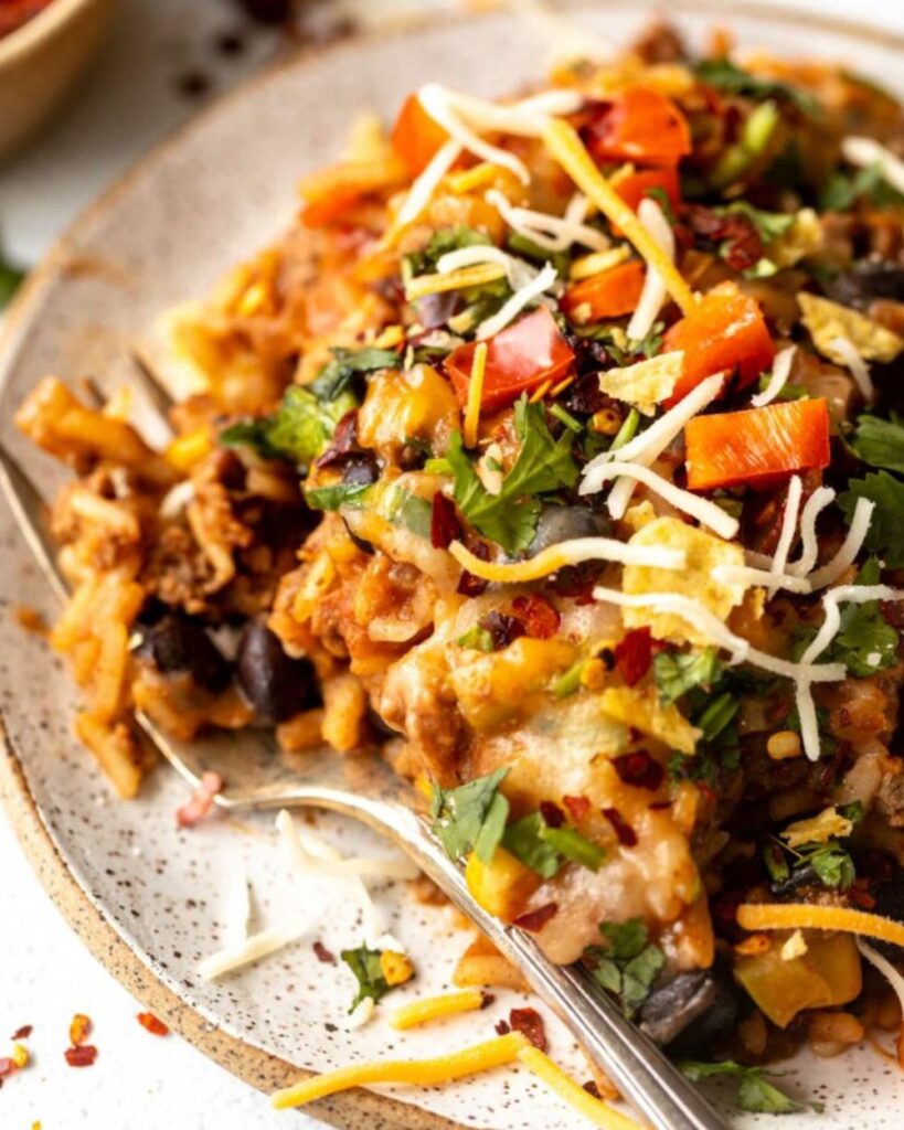 arnish with chopped green onions before serving. Enjoy your Crack Chicken warm on buns or over rice for a delicious meal!