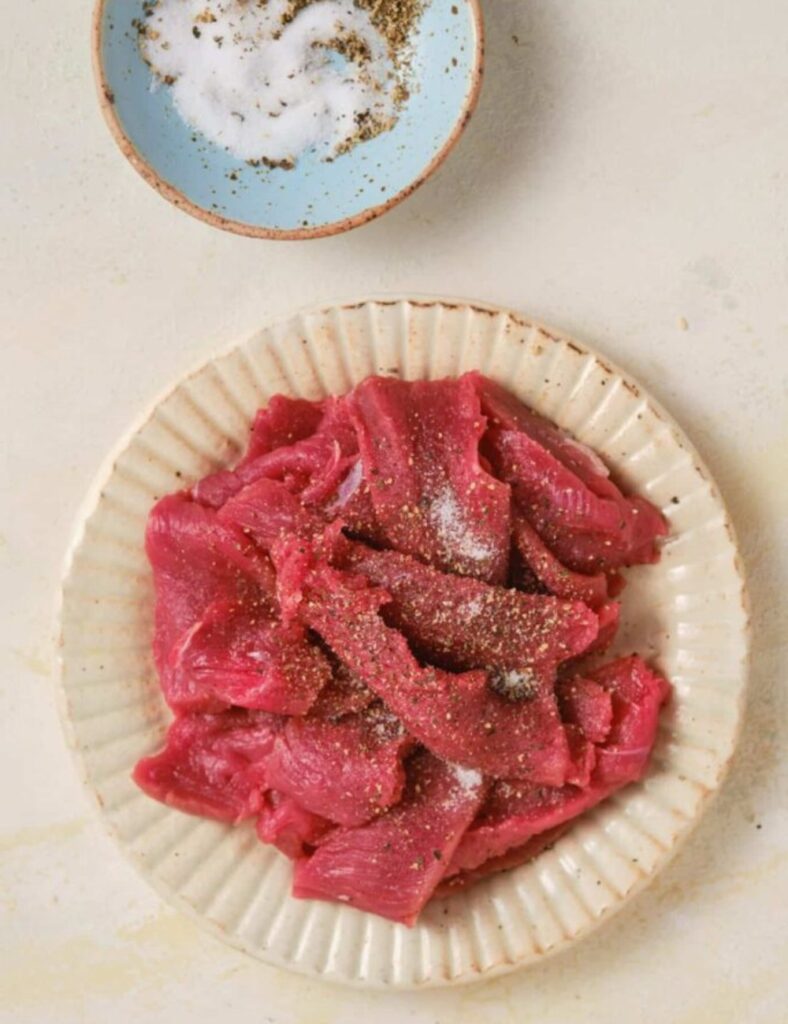 Corn tortillas
Cheese (such as Oaxaca or Chihuahua cheese)
Meat (such as carne asada, or chicken)
Onion (chopped)
Cilantro (chopped)
Salsa
Lime wedges