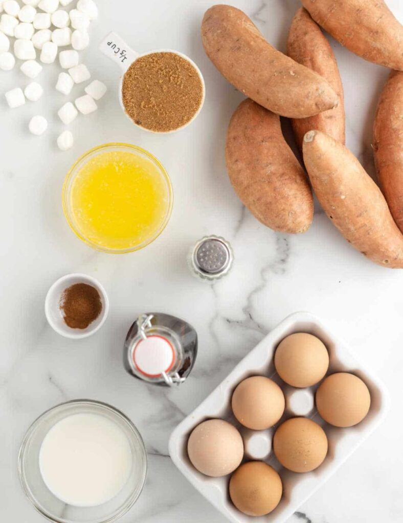 sweet potatoes, peeled and cubed
1/3 cup brown sugar,
1/4 cup butter, melted,
1/2 cup milk,
1 teaspoon vanilla extract,
1/4 teaspoon salt,
1 cup mini marshmallows,
1/2 cup chopped pecans (optional)
Eggs