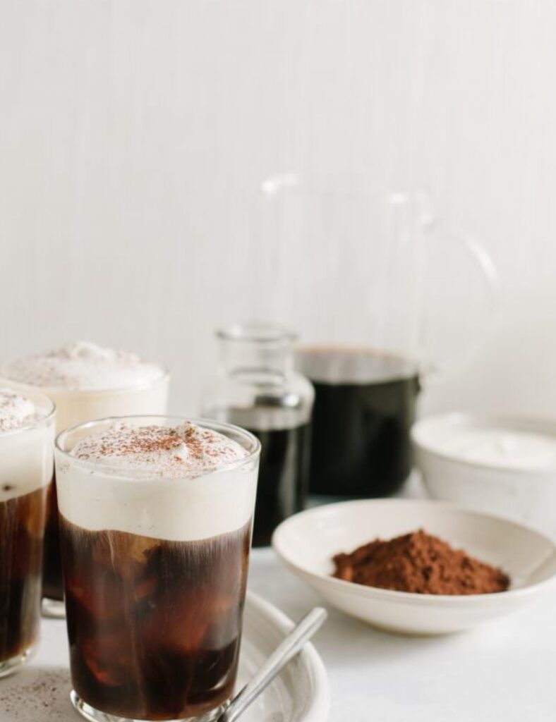 Starbucks Irish Cream Cold Brew drink with creamy topping and coffee art