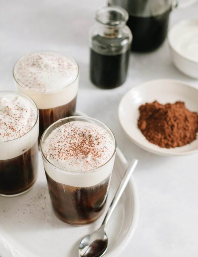 Starbucks Irish Cream Cold Brew drink with creamy topping and coffee art