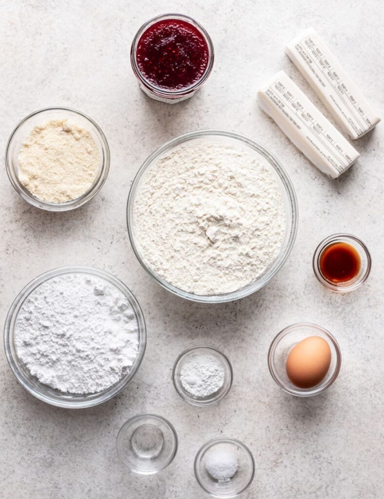 a group of bowls of flour and other ingredients