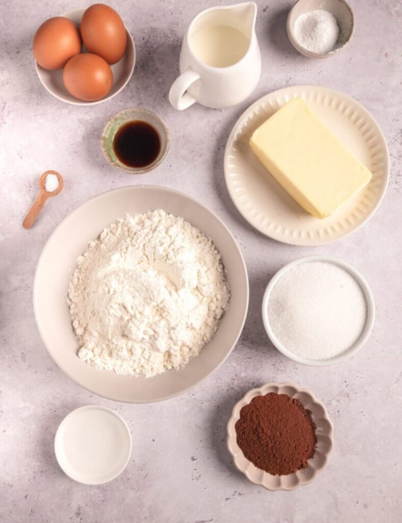 1 3/4 cups all-purpose flour,
1 cup granulated sugar,
3/4 cup unsalted butter, softened,
3/4 cup milk,
3 1/2 teaspoons baking powder,
1 teaspoon vanilla extract,
1/2 teaspoon salt,
1/4 cup unsweetened cocoa powder,
3 large eggs