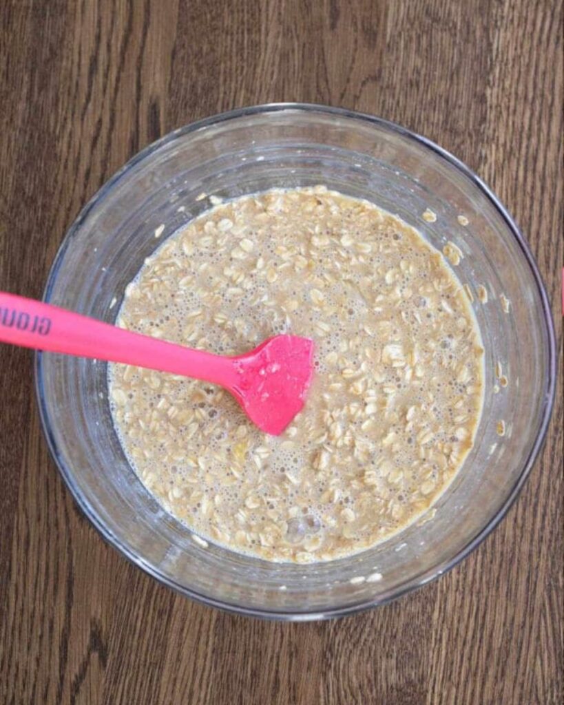 Gradually add the dry ingredients to the wet mixture. Stir until just combined. Be careful not to overmix; it's okay if there are a few lumps.