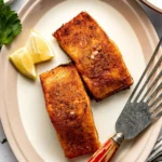 Deliciously cooked air fryer salmon served with lemon and herbs