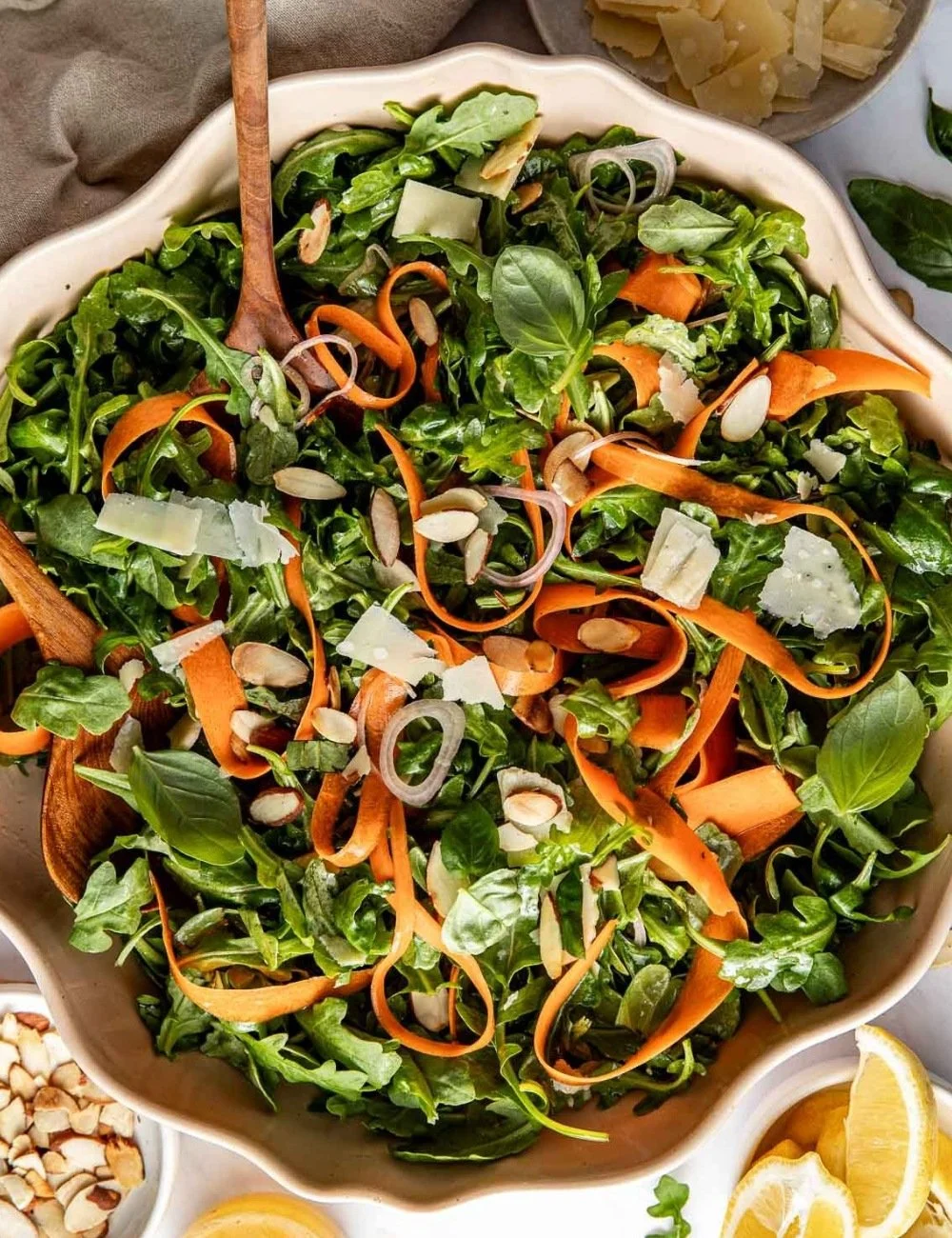 Arugula salad with lemon and basil garnished for a fresh and healthy dish.