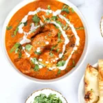 Delicious bowl of authentic Chicken Tikka Masala served with rice