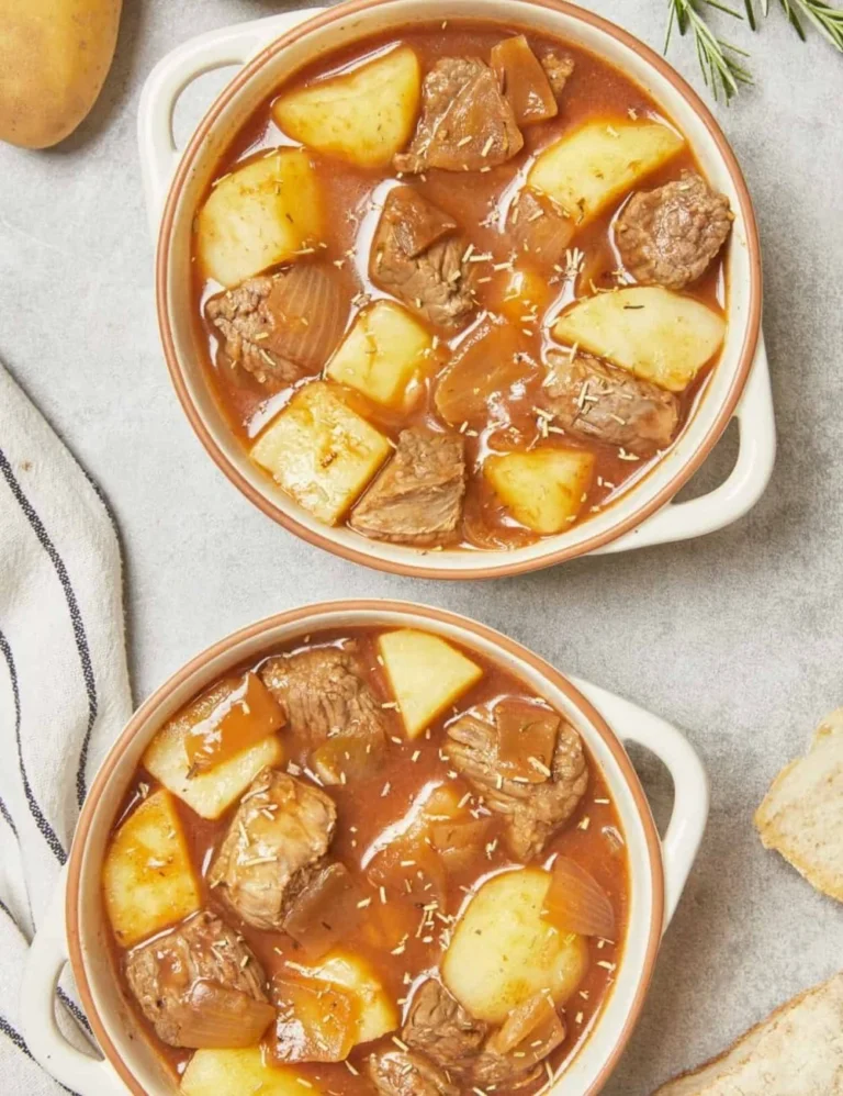 Delicious beef and potato stew served in a rustic bowl