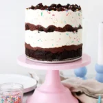 A beautifully designed birthday ice cream cake with colorful sprinkles.