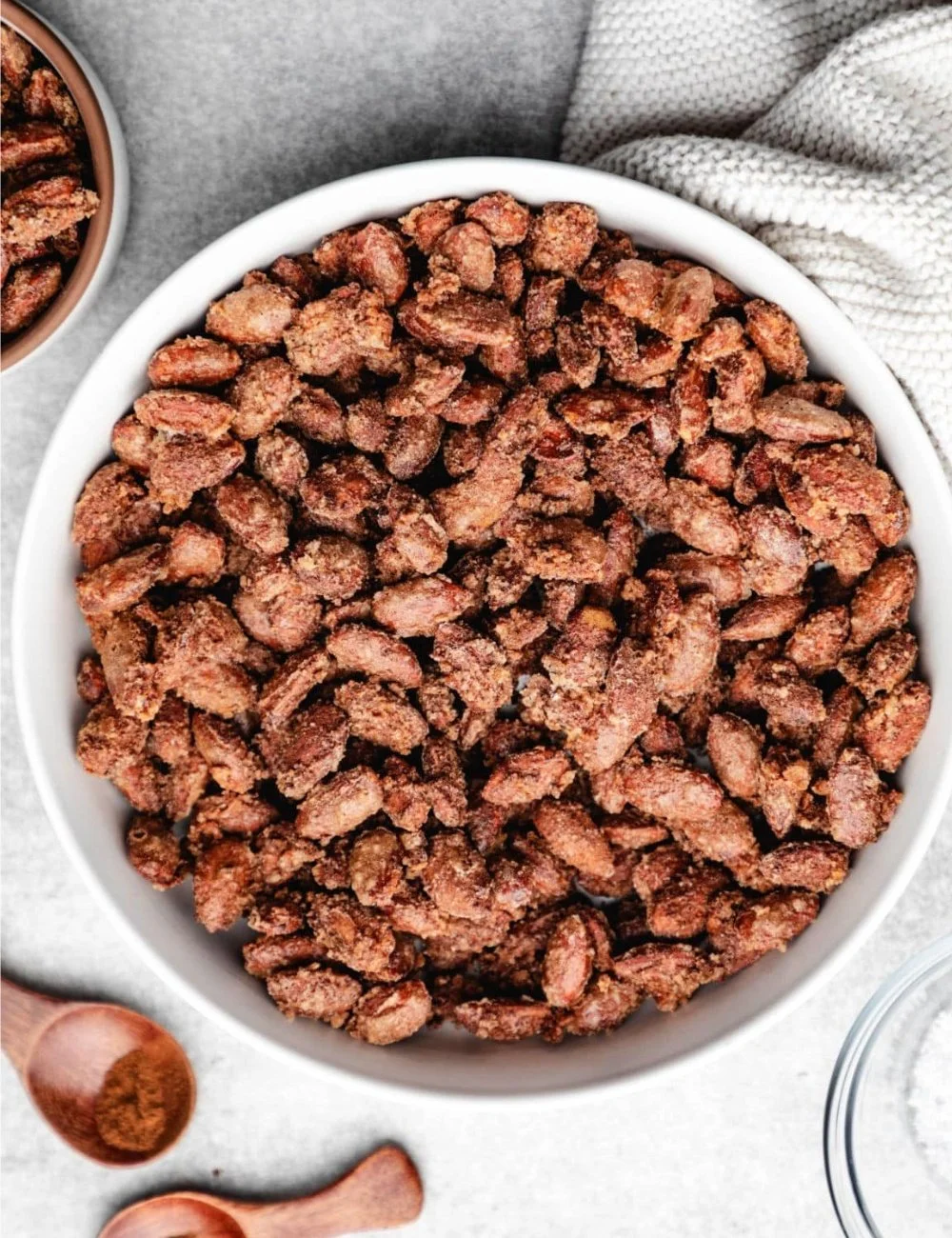 Bowl of delicious homemade candied almonds with a caramelized glaze