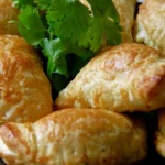 Delicious chicken curry puffs with golden crust and savory filling