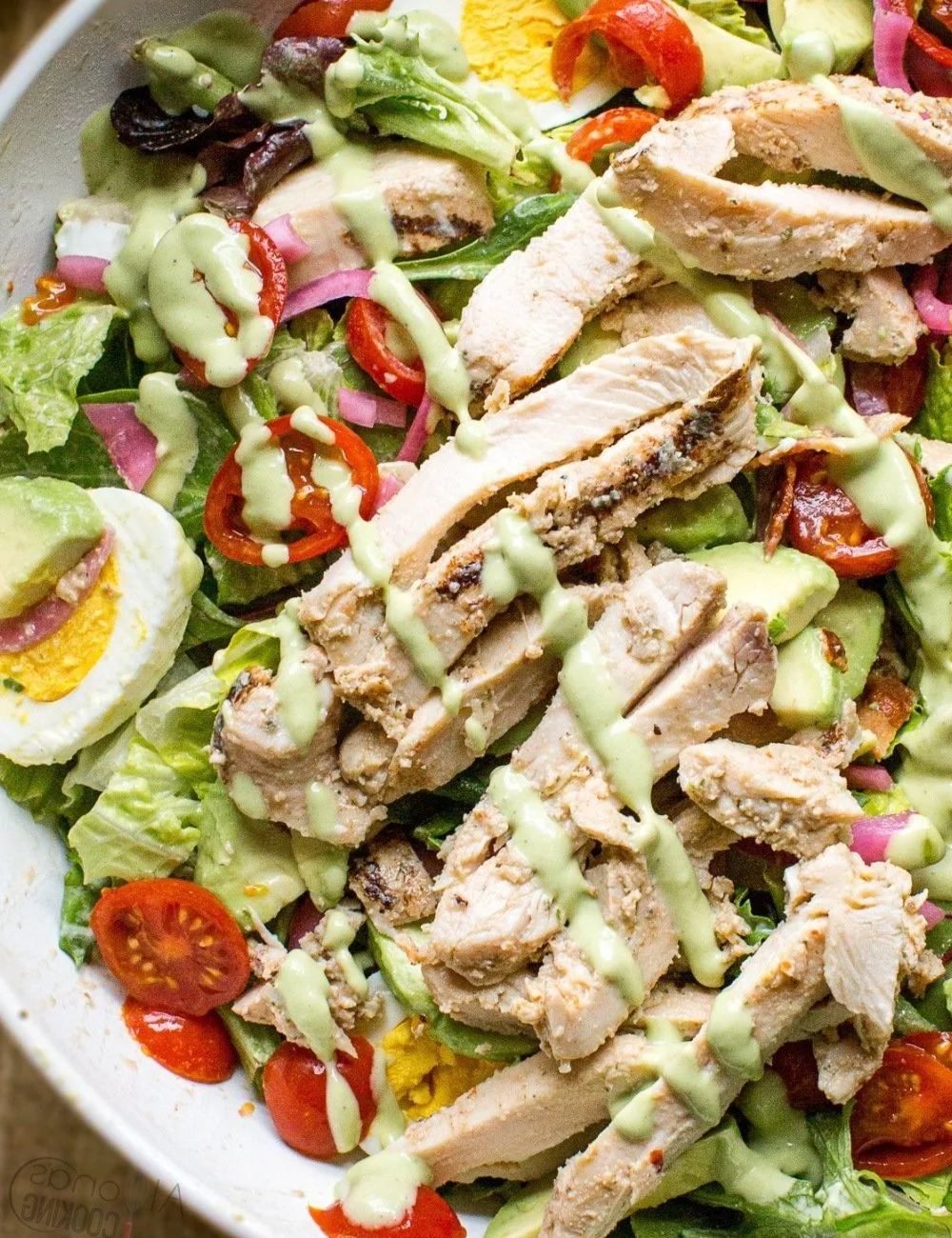 Cobb Salad topped with Green Goddess Dressing and fresh ingredients