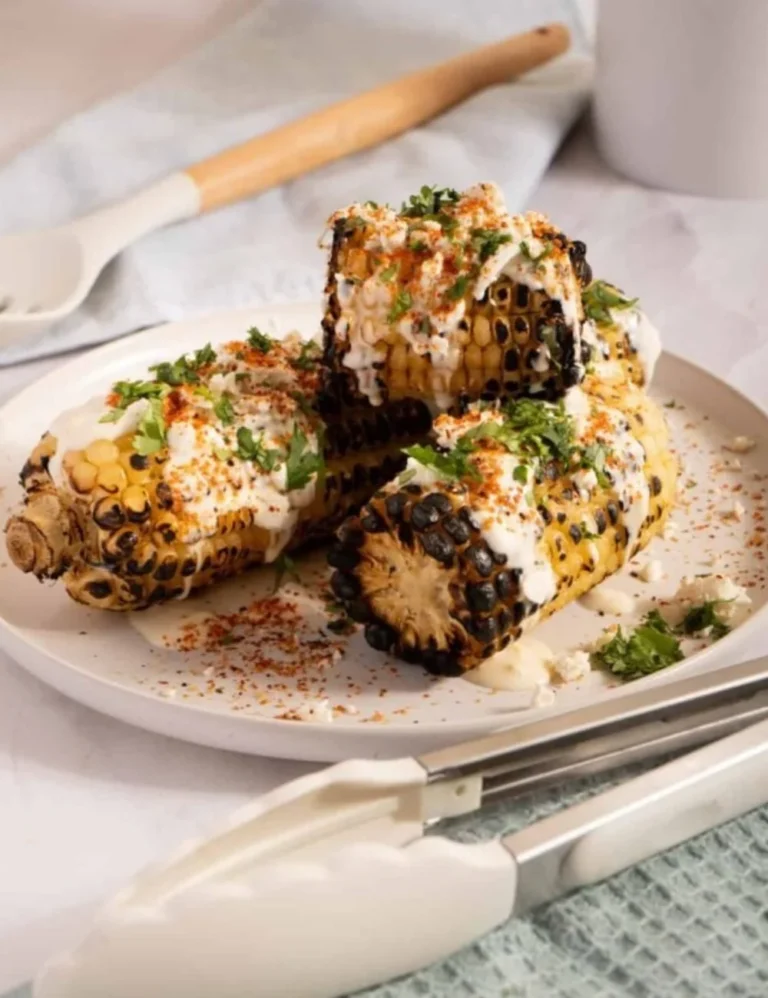Delicious elote, Mexican street corn covered in cheese and spices