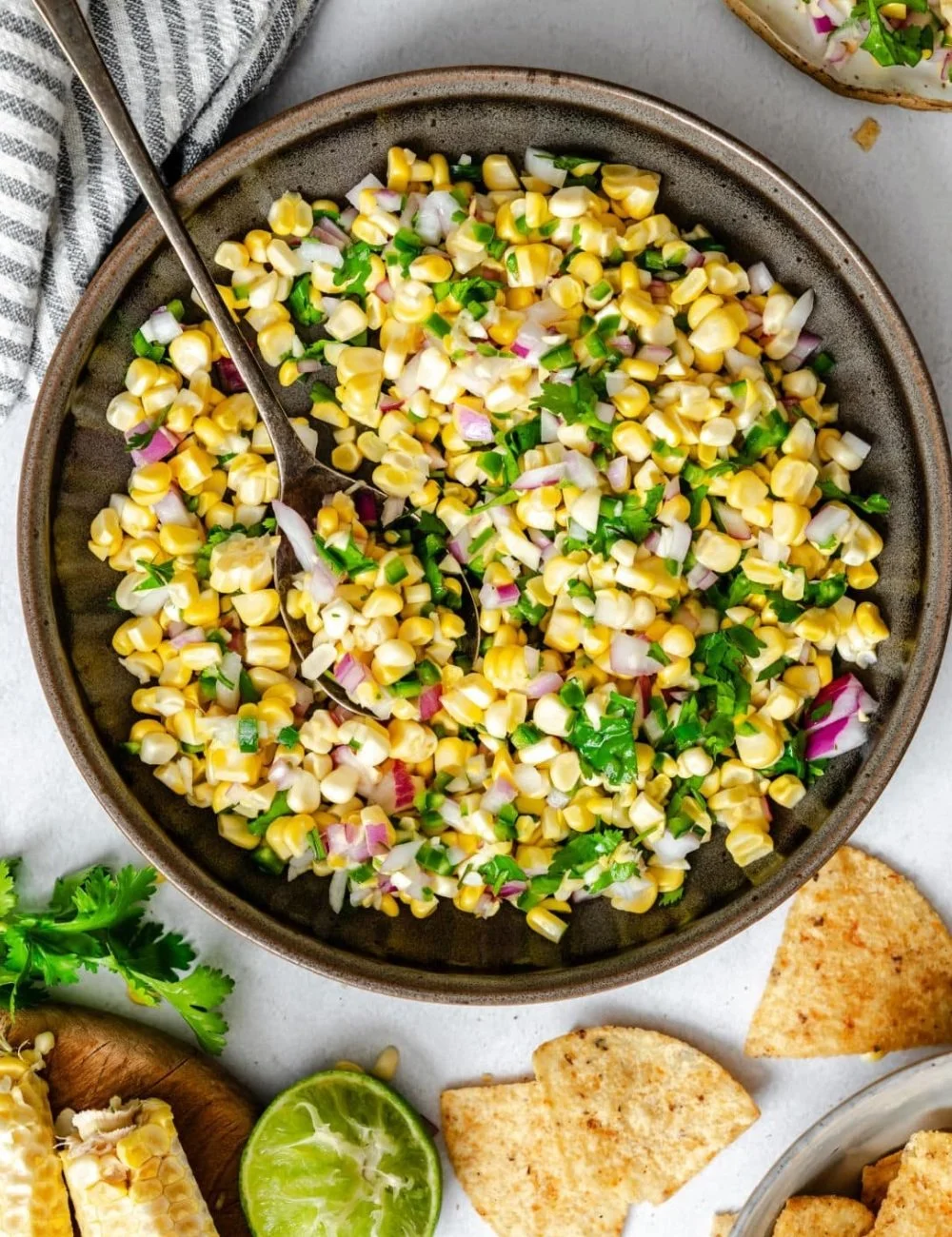Bowl of fresh corn salsa with colorful ingredients