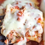 Delicious Lasagna Roll Ups baked with cheese and meat sauce