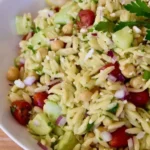 Bright and vibrant Lemon Orzo Salad with fresh herbs and a zesty dressing