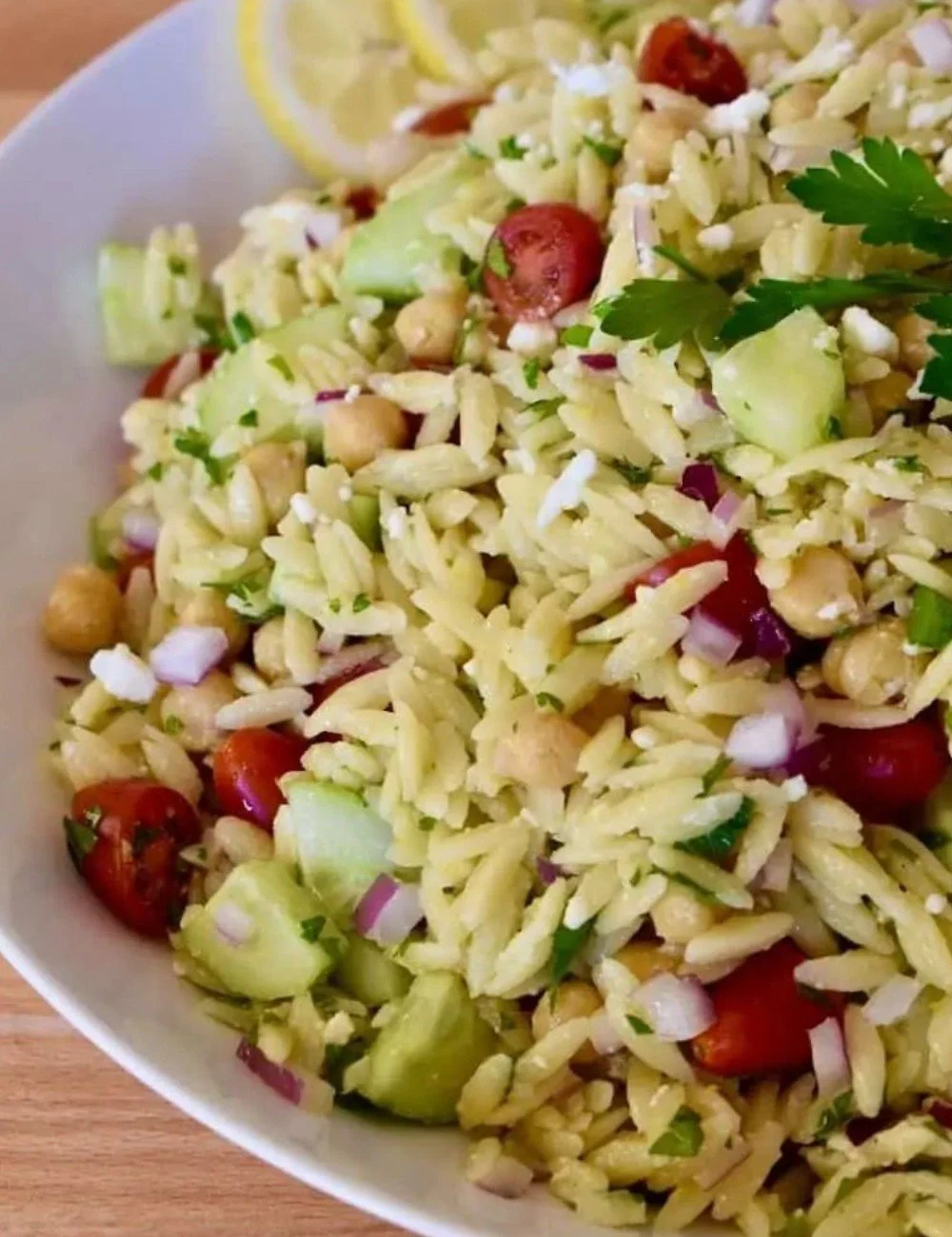 Bright and vibrant Lemon Orzo Salad with fresh herbs and a zesty dressing