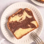 Deliciously swirled marble cake with chocolate and vanilla flavors.