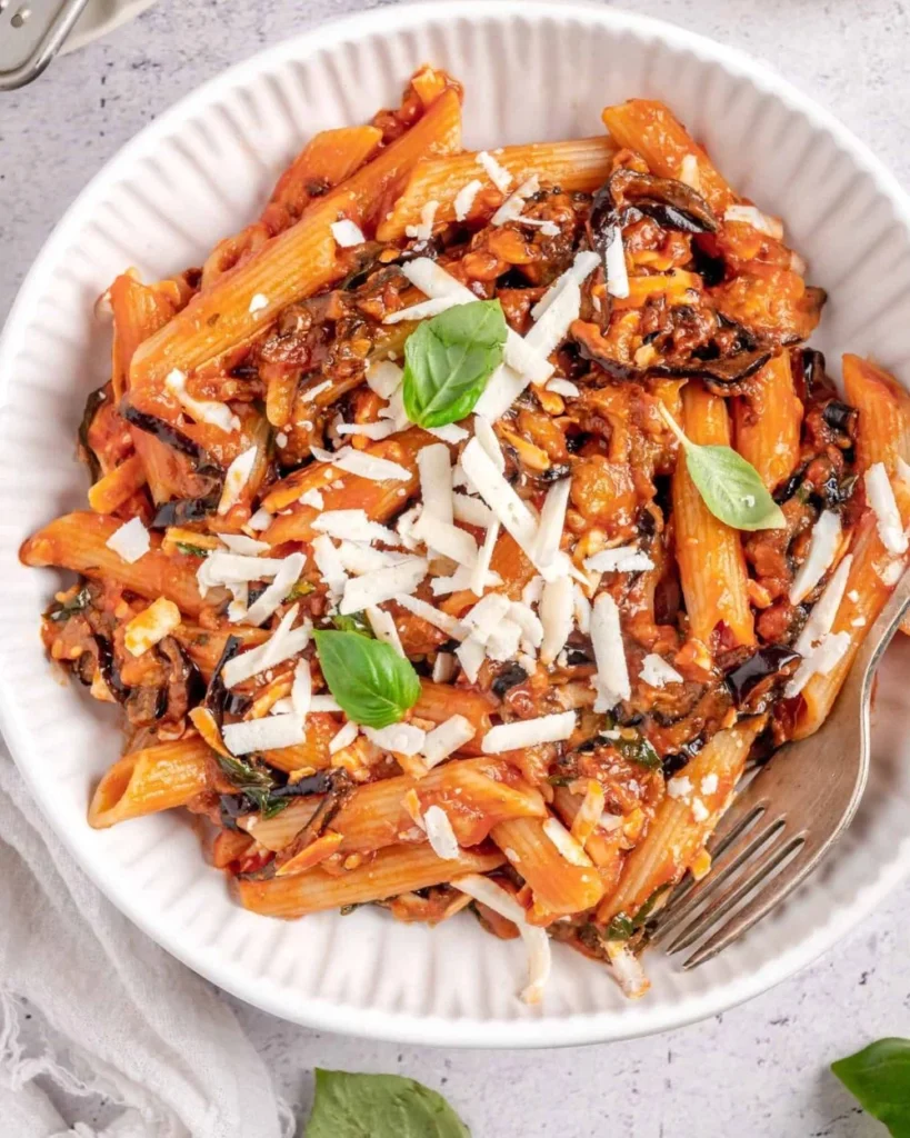 A delicious plate of Pasta Alla Norma with eggplant and ricotta cheese