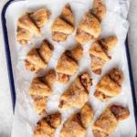 Delicious homemade rugelach pastries filled with chocolate and nuts.