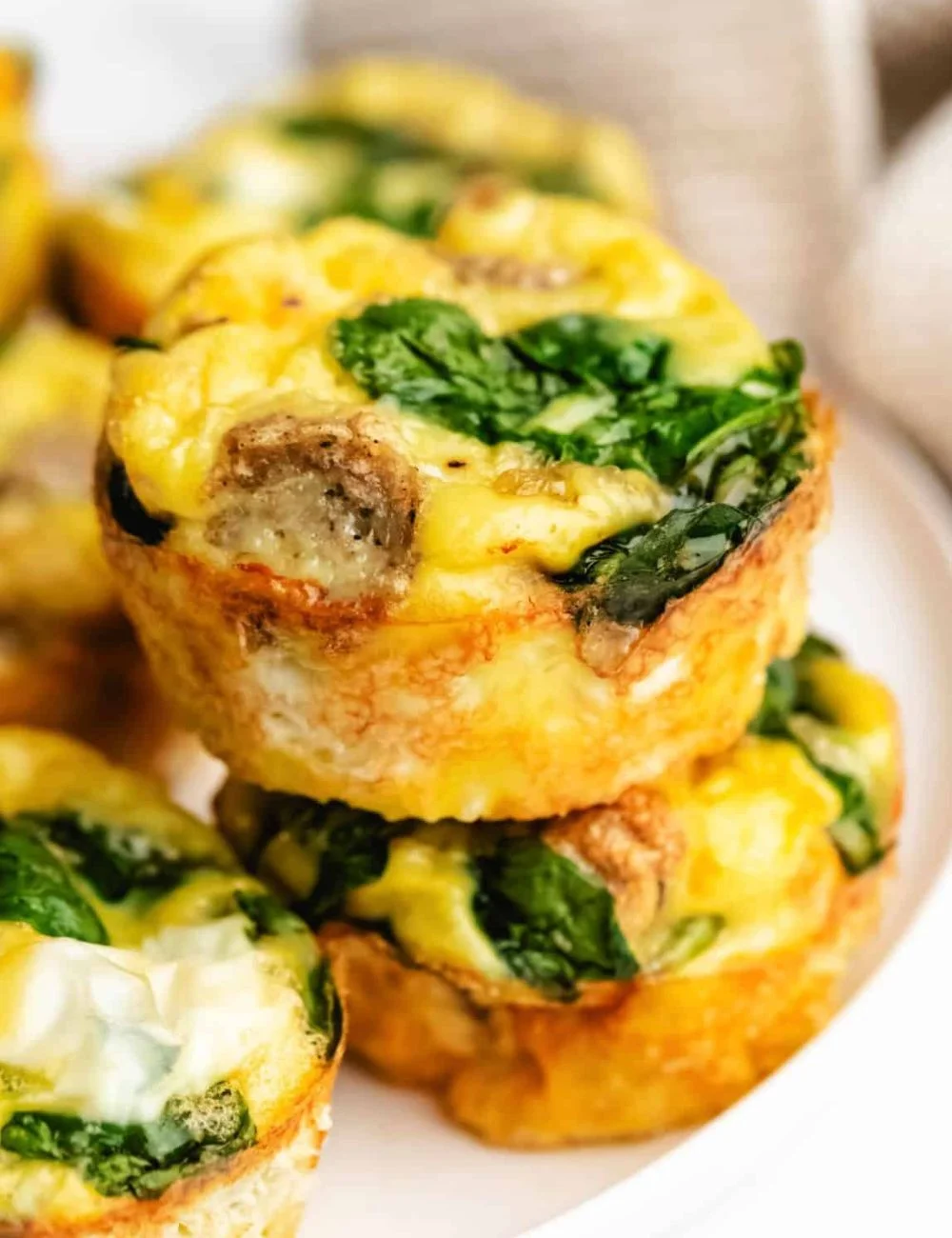 Freshly made Sausage Egg Muffins on a breakfast plate