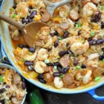 A vibrant Skillet Jambalaya dish filled with shrimp, sausage, and vegetables.