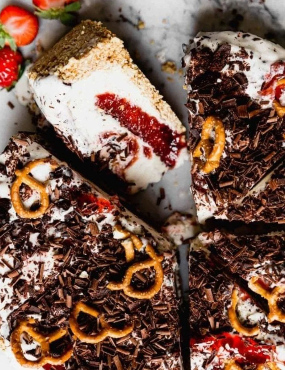 Delicious Strawberry Pretzel Ice Cream Pie with a crunchy crust and fresh strawberries.
