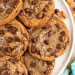 Delicious homemade Toll House Cookies fresh out of the oven with chocolate chips