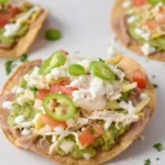 Crispy tostadas topped with fresh ingredients and vibrant colors