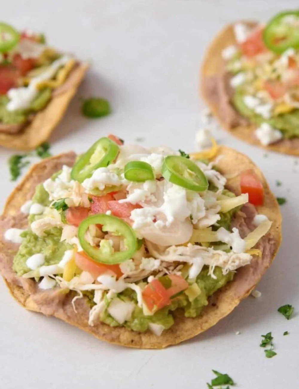 Crispy tostadas topped with fresh ingredients and vibrant colors