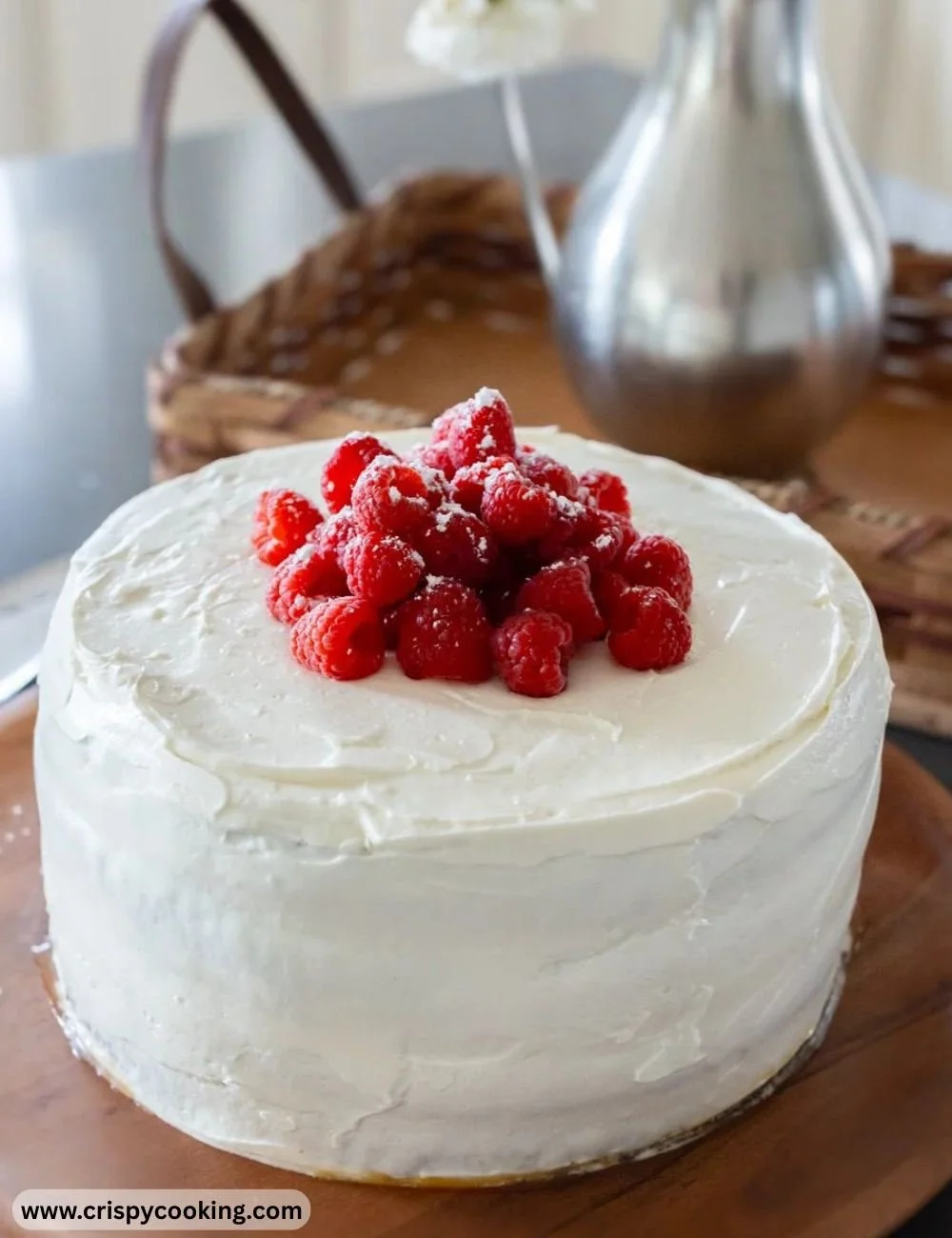 Whole Wheat Raspberry Honey Cake topped with fresh raspberries and honey glaze.