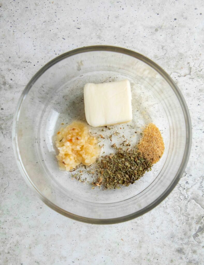 butter and black pepper and other things in a bowl