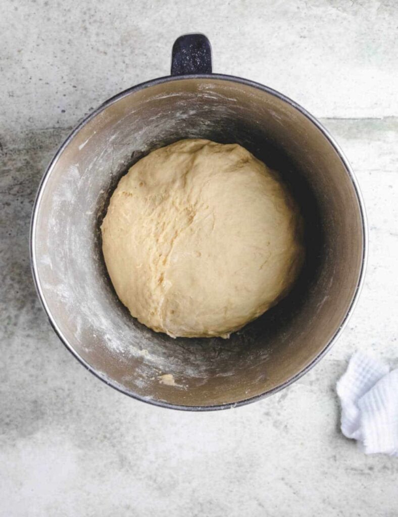 1. Dough balls arranged neatly on a baking sheet, ready for baking.
