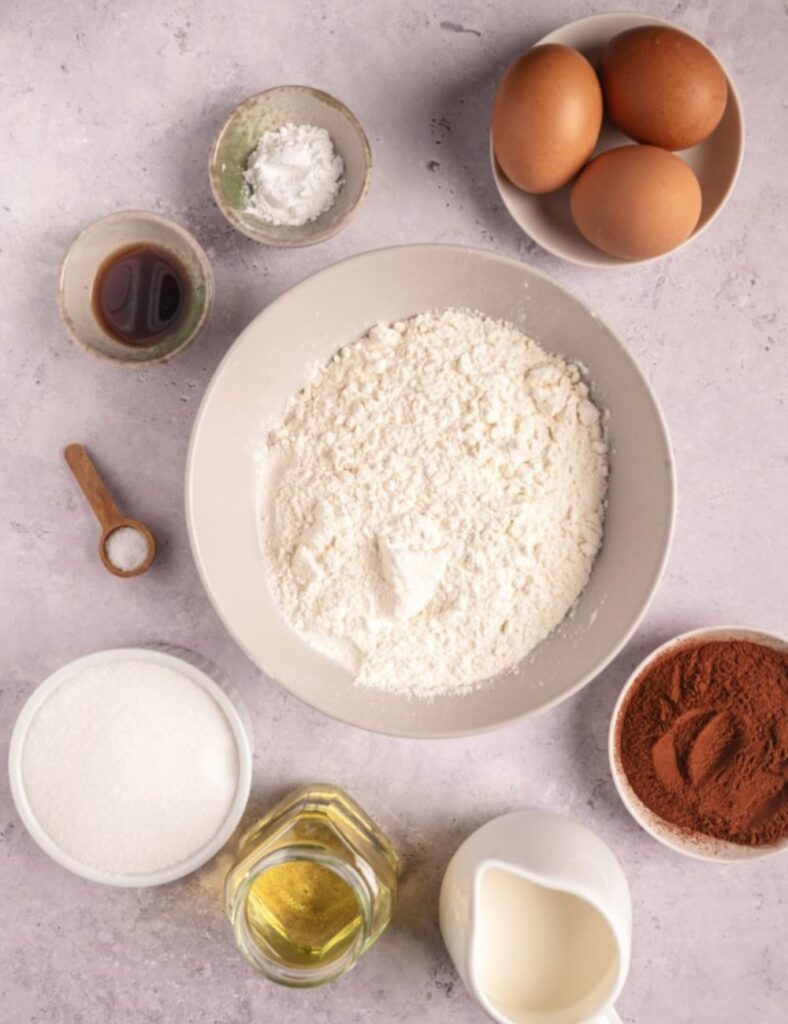 1 1/2 cups all-purpose flour,
1 cup sugar,
1/2 cup unsalted butter, softened,
2 large eggs,
1/2 cup milk,
1 teaspoon vanilla extract,
1/2 teaspoon baking powder,
1/4 cup cocoa powder,
1/4 teaspoon salt