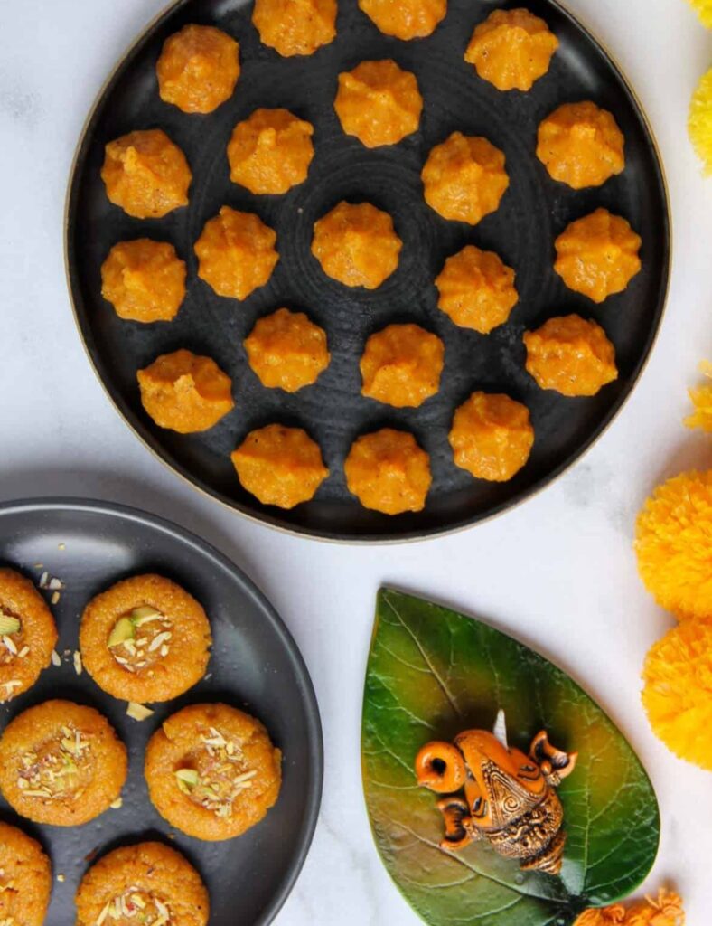 Delicious Mawa Modak sweets served on a traditional platter.