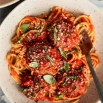Delicious baked Italian meatballs served on a wooden platter