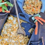 Delicious Buffalo Chicken dish garnished with celery and blue cheese