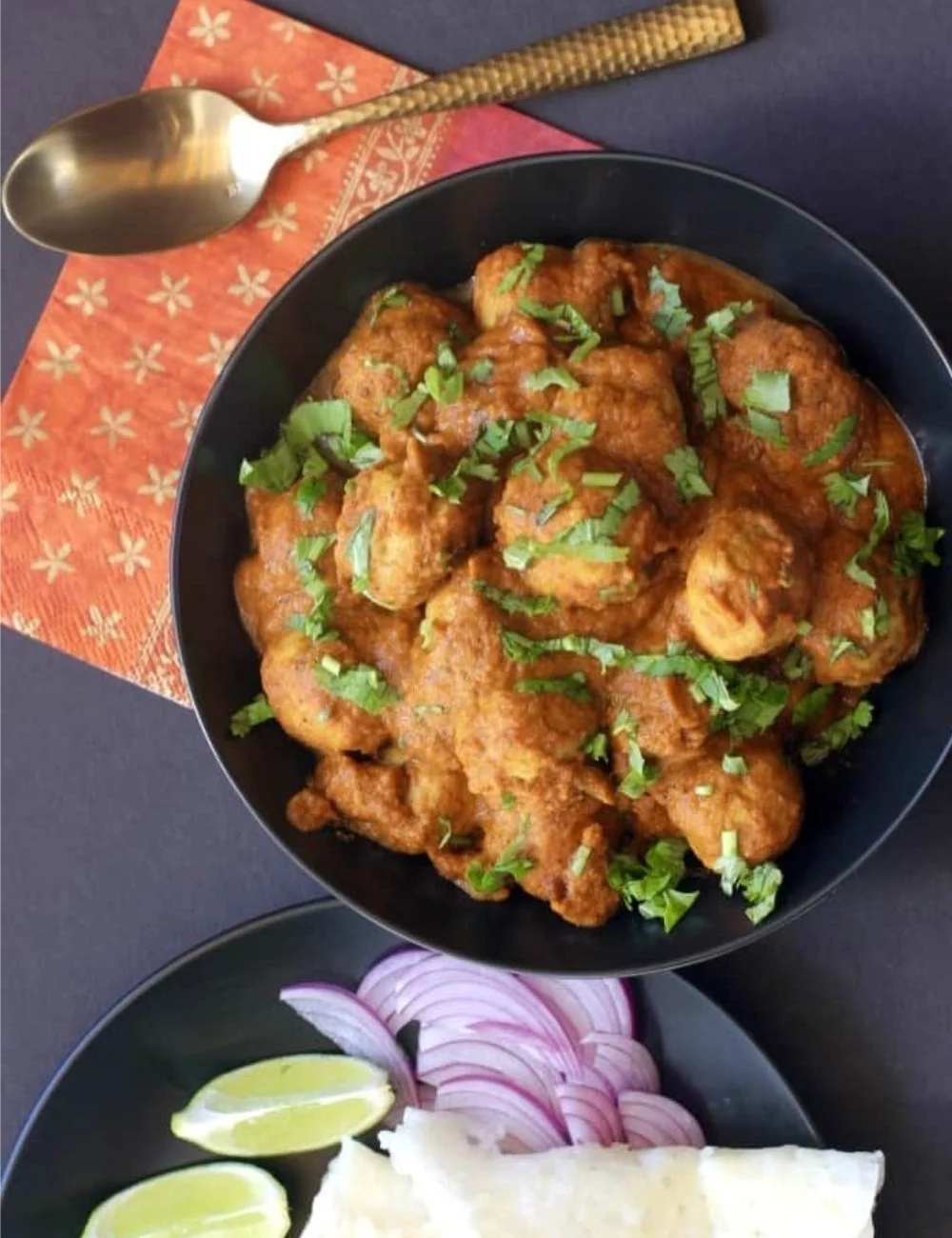 Delicious Chicken Meatball Curry served with rice in a bowl