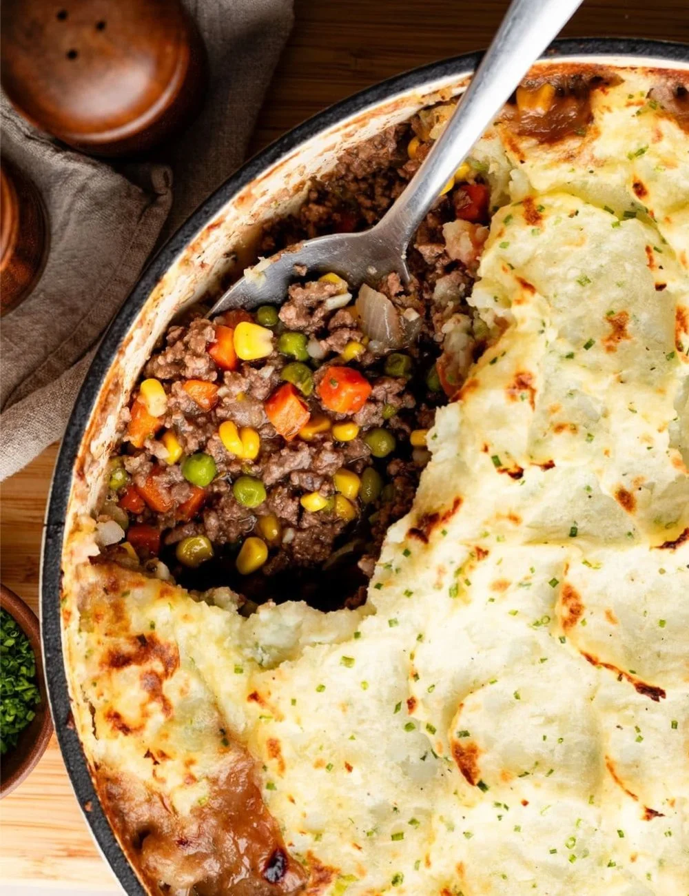 Delicious Cottage Pie topped with garlic mashed potatoes, served in a bowl.