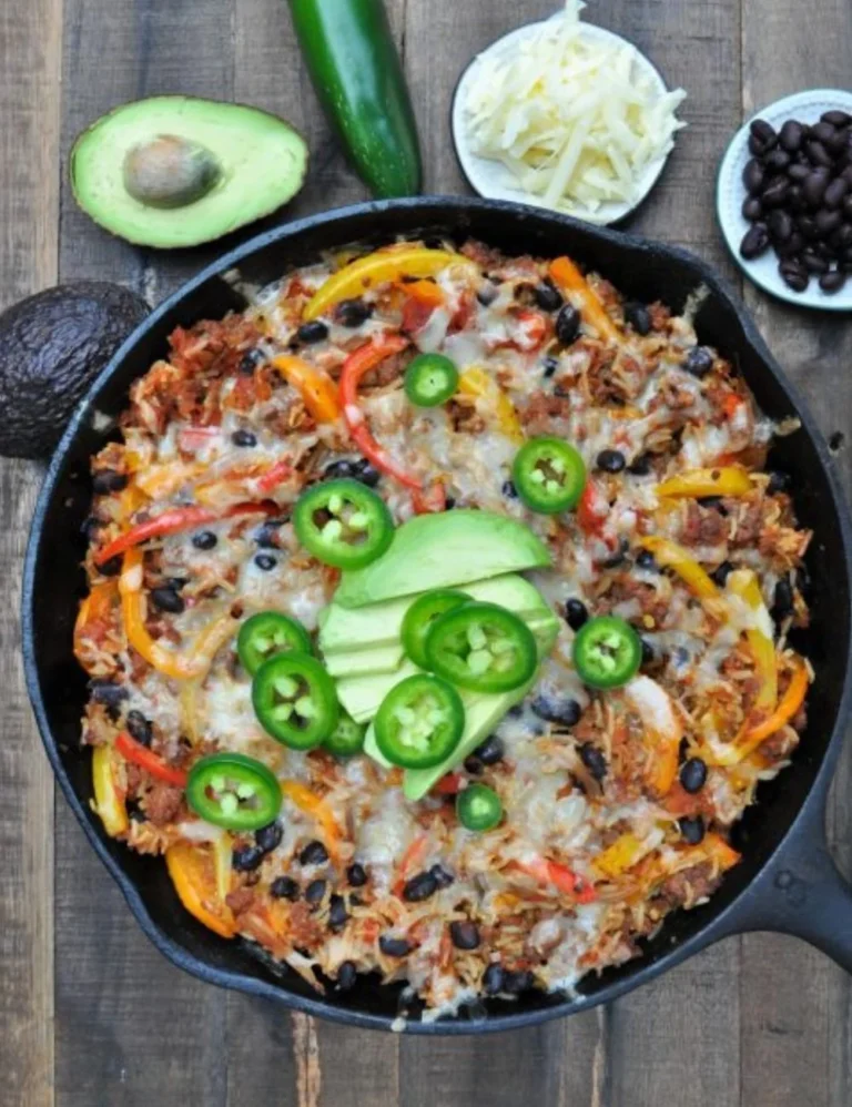 Delicious fajita skillet with colorful vegetables and grilled meat