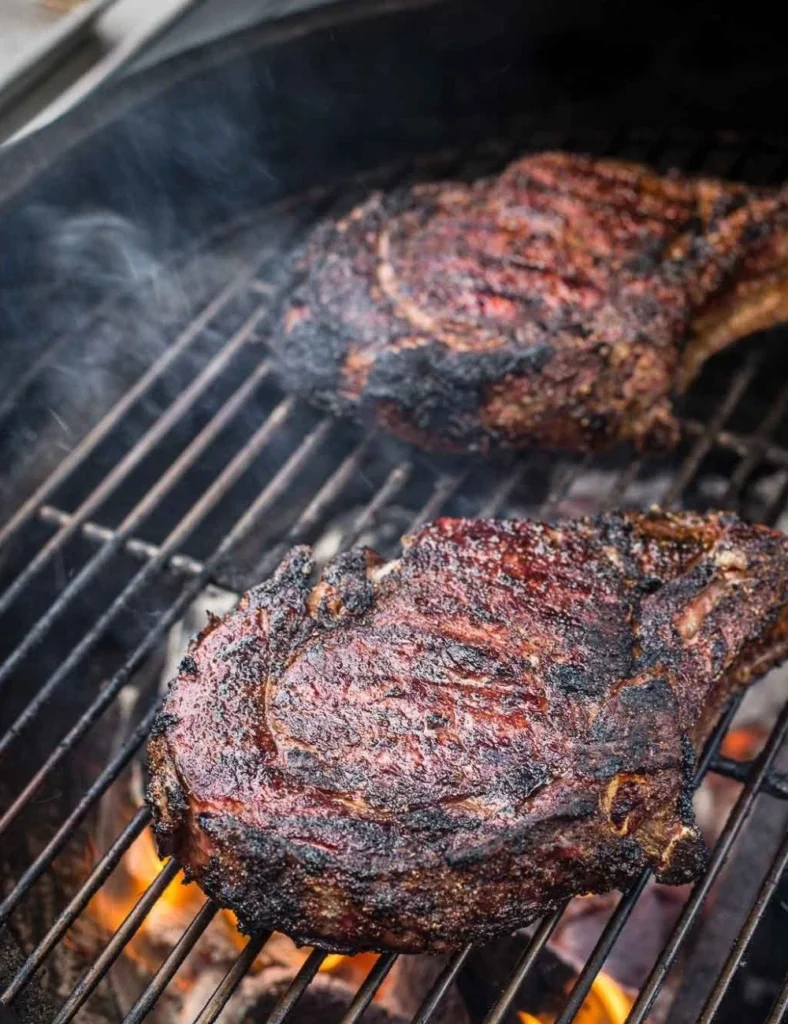 Juicy grilled Cowboy Ribeye Steak served on a plate
